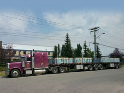 Local and cross border heavy haul, Super-B and flat deck trucking