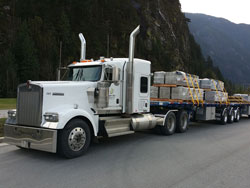Western Canada and cross border heavy haul, Super-B and flat deck trucking